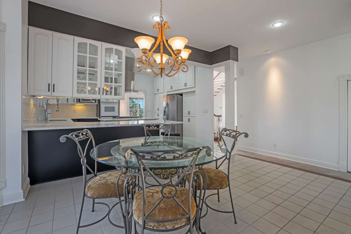 Notice the abundant storage cabinets on each side of the refrigerator.