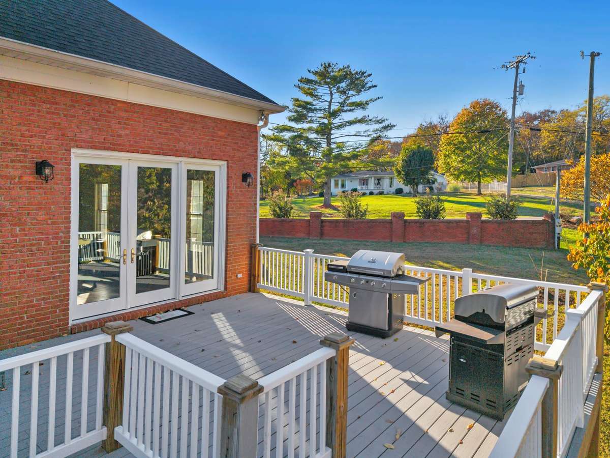 Gain access to the deck through these triple French doors from the family room.