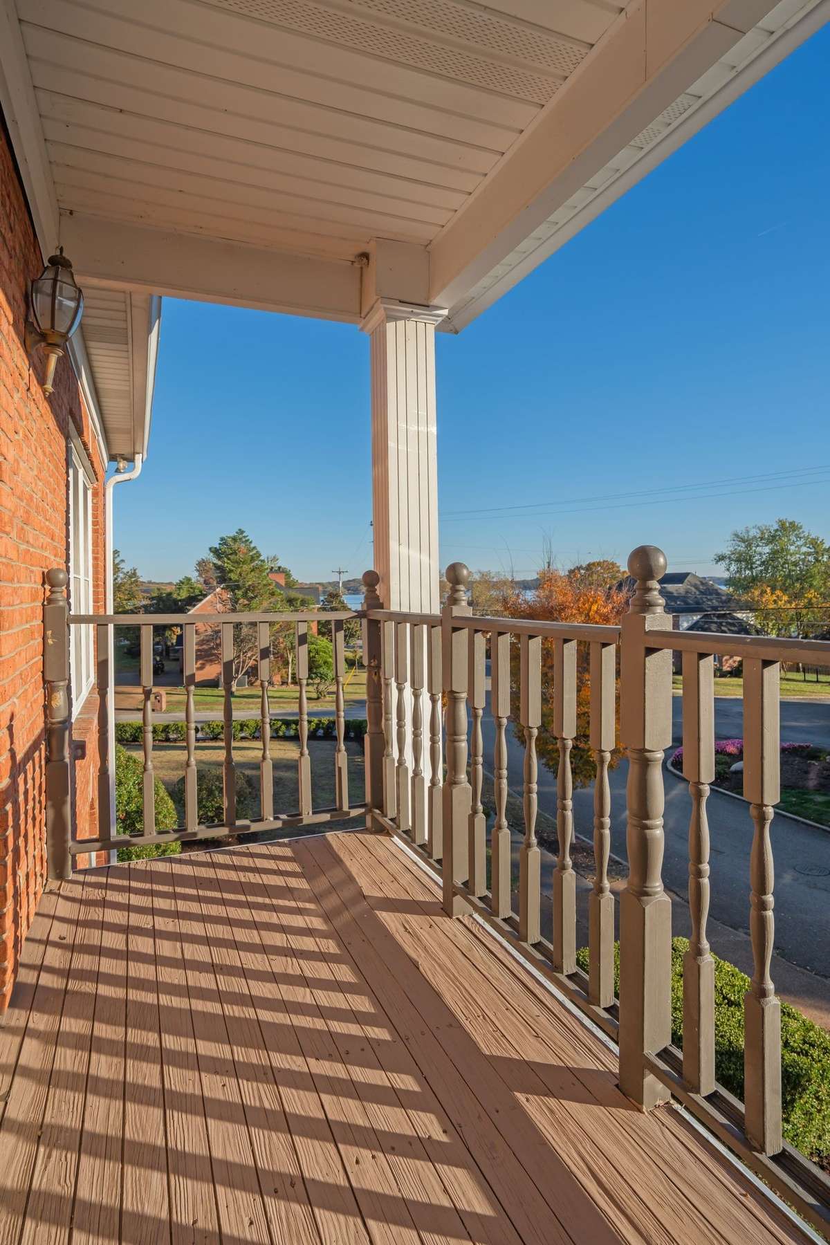 This upper level balcony is above the front porch and is accessed via a catwalk above the foyer.