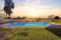 Huge 20x40 in ground pool and large level backyard for hosting family gatherings, parties, or just floating on a raft after a long day