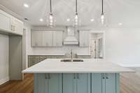 Please note - the pendent lighting will be switched to gold to match the other hardware in the kitchen. The oven and dishwasher is estimated to be installed the week of August 24th.