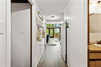 Entry foyer with bedroom to left and bathroom to the right.