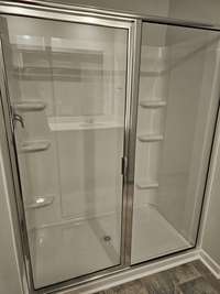 Seperate shower and water closet.