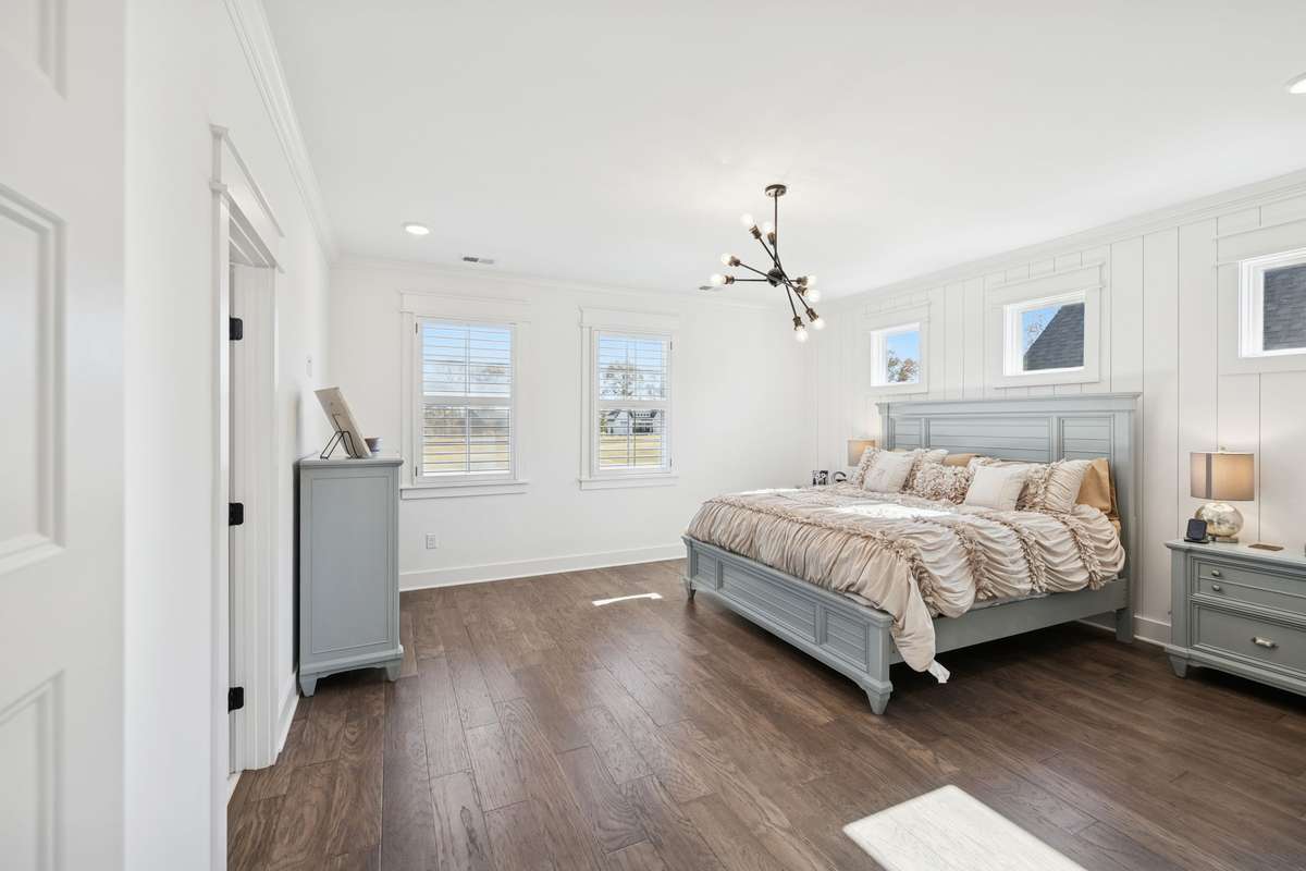 Wake up to beautiful hardwood floors and a serene environment.