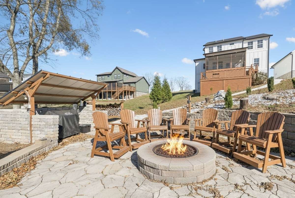 Settle in and enjoy the fire with Tims Ford Lake as your backdrop.