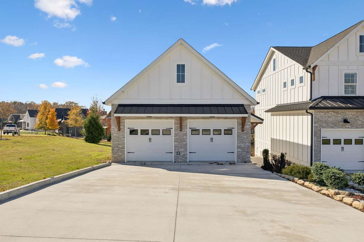 Oversized two-car detached garage offers incredible storage and utility.