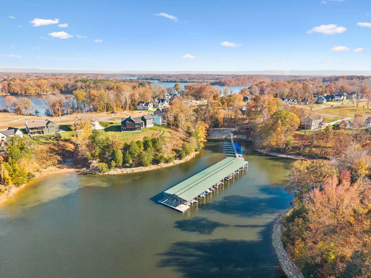 Your gateway to the lake! Property includes a boat slip at Dock 5, conveniently located behind the clubhouse.