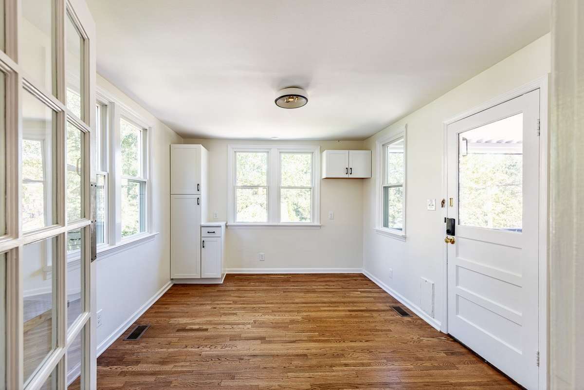 Just off the kitchen through a fun swinging door is the pantry/ mudroom. You could add a table for family dining, or add a second fridge. Add a few hooks and a desk, and have a homework/work station. There are many ways to make this room fit you!
