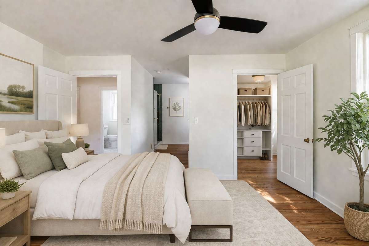 The beautiful natural light continues throughout the home and into this primary suite. 
**Ai generated/Virtually staged photo**