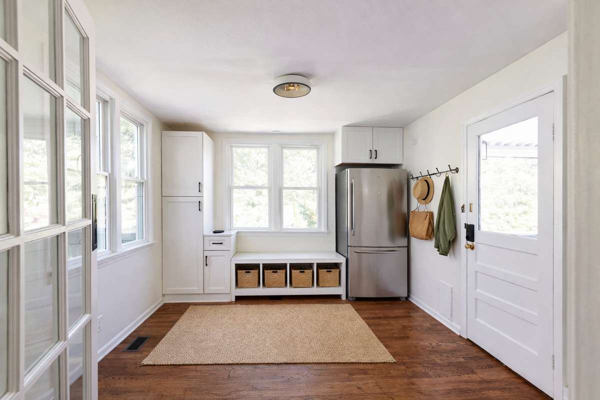 One idea is to make this space a pantry/mudroom. 
**Ai generated/Virtually staged photo**