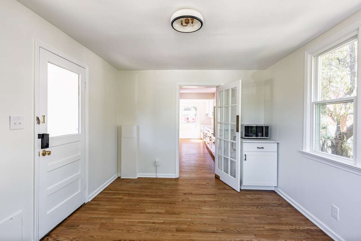 Add a table for dining or desks for a homework room/ semi-private office.The door on the left leads you to your covered porch!