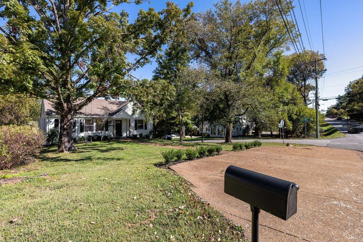 This is a corner lot with a large parking pad for additional guest parking. No direct neighbors on one side and the rear neighbor faces the side street.