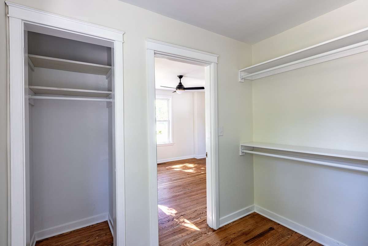 The closet on the left was the original closet and is perfect for long dresses or long coats. We quadrupled the closet space!