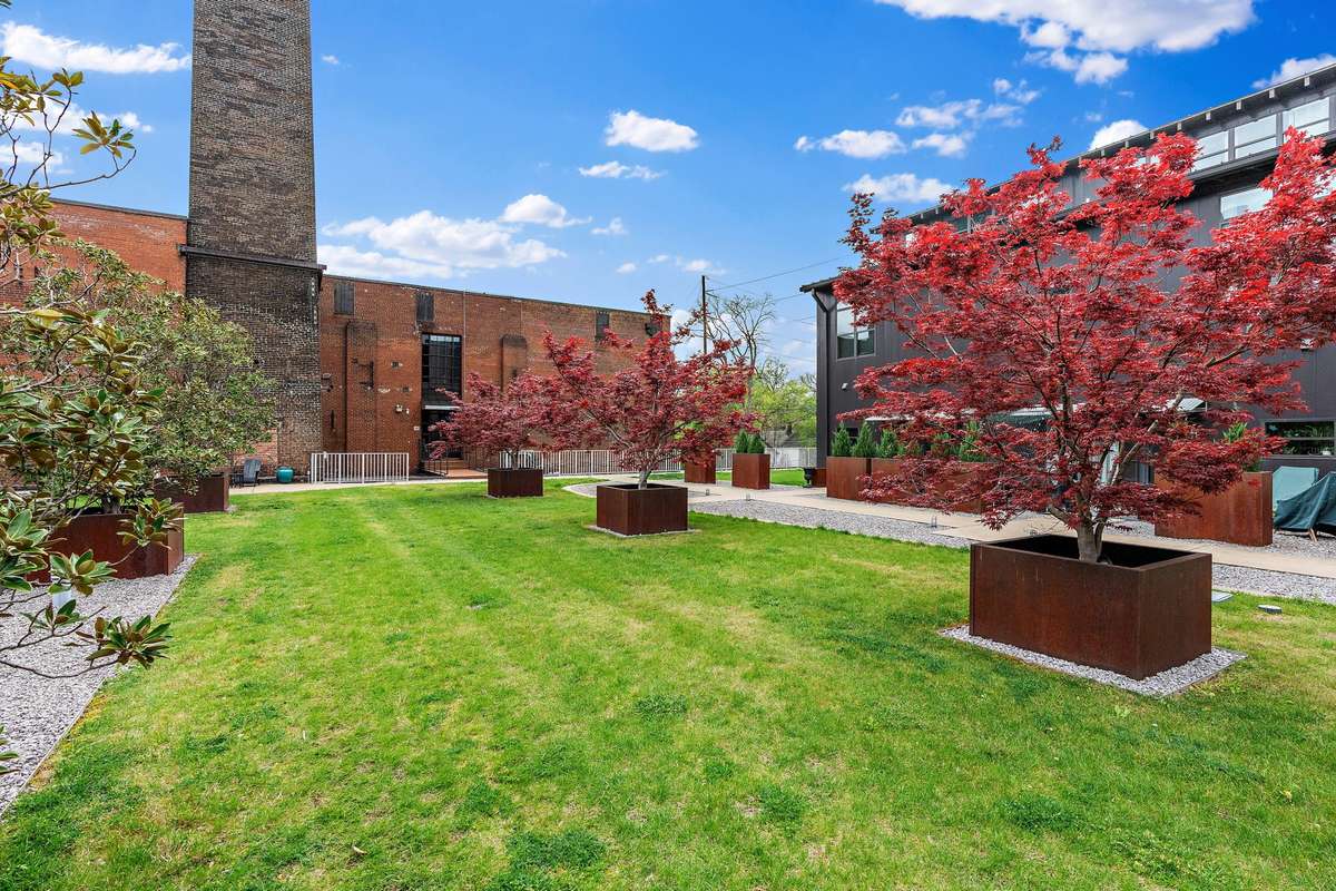 Bocce court + private cabana with outdoor Kitchen is on your left next to the larger pool