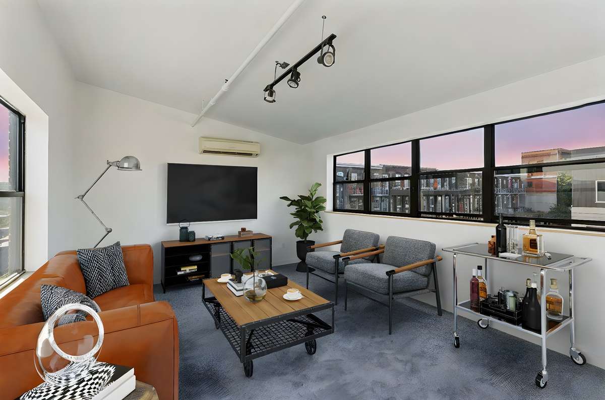 Two walls of windows provide an abundance of natural light