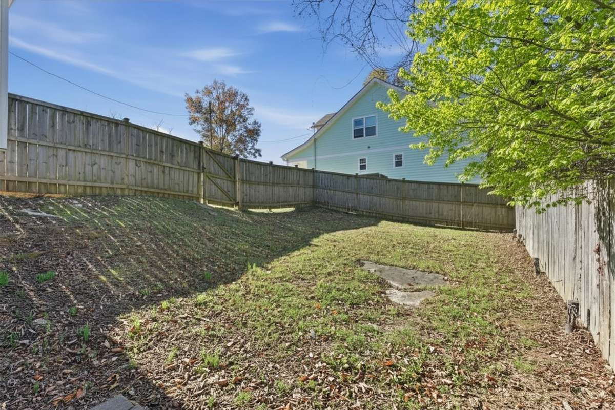Photos have been virtually enhanced to reflect spring foliage and seasonal landscaping.