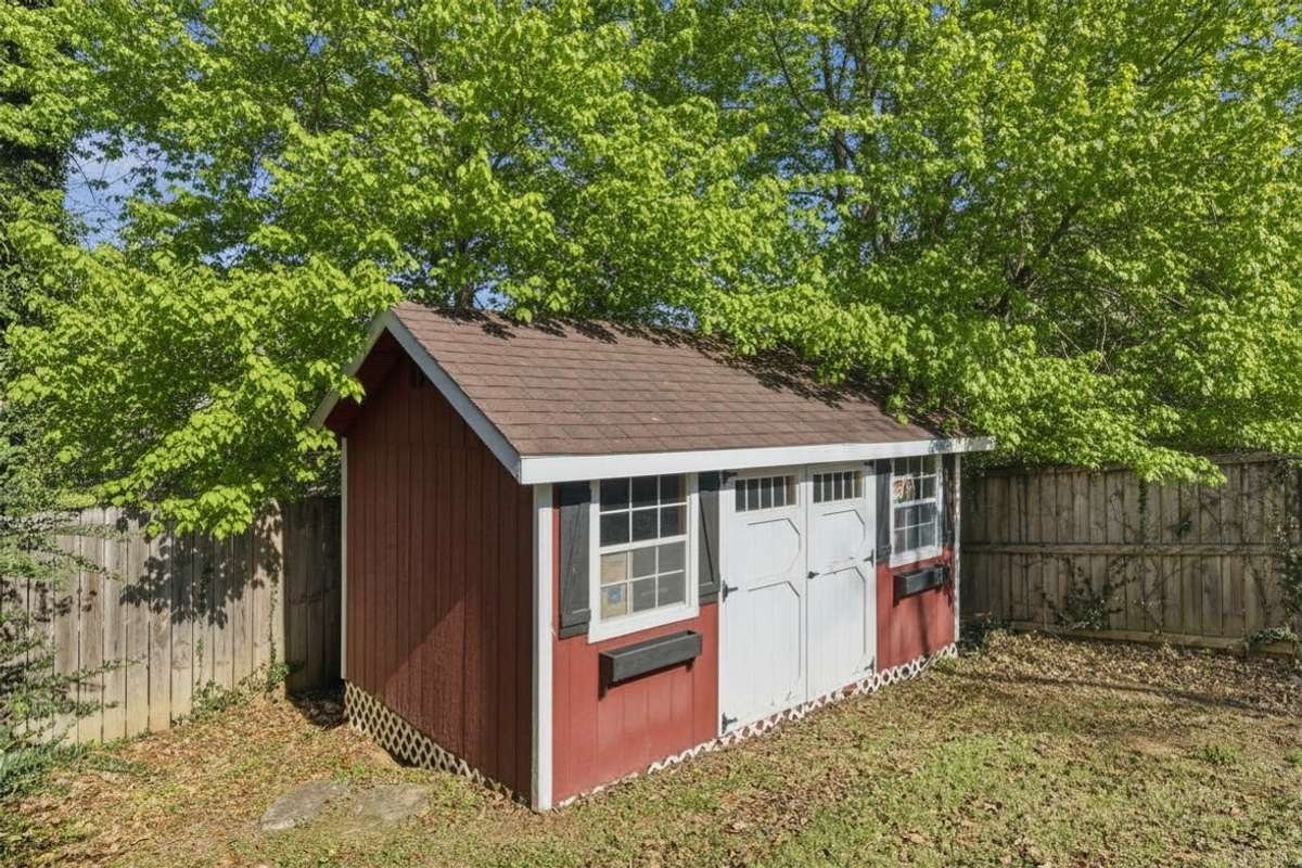 Photos have been virtually enhanced to reflect spring foliage and seasonal landscaping.