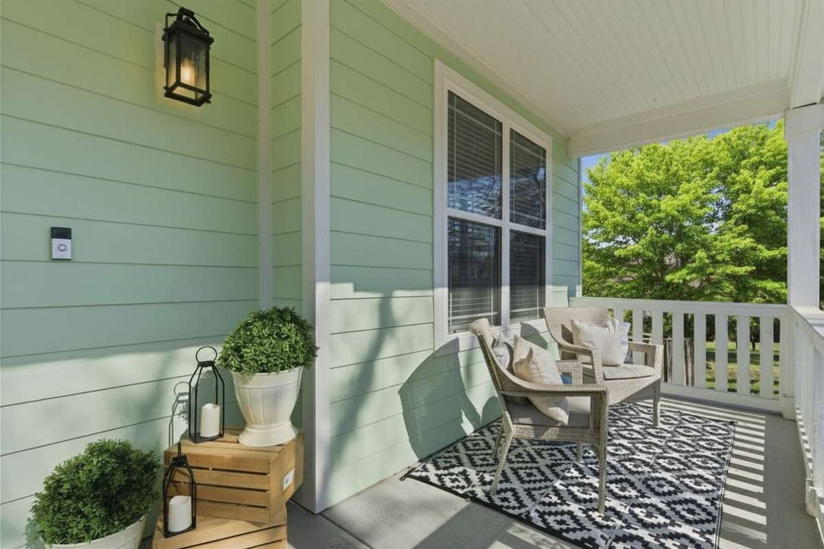 Photos have been virtually enhanced to reflect spring foliage and seasonal landscaping.