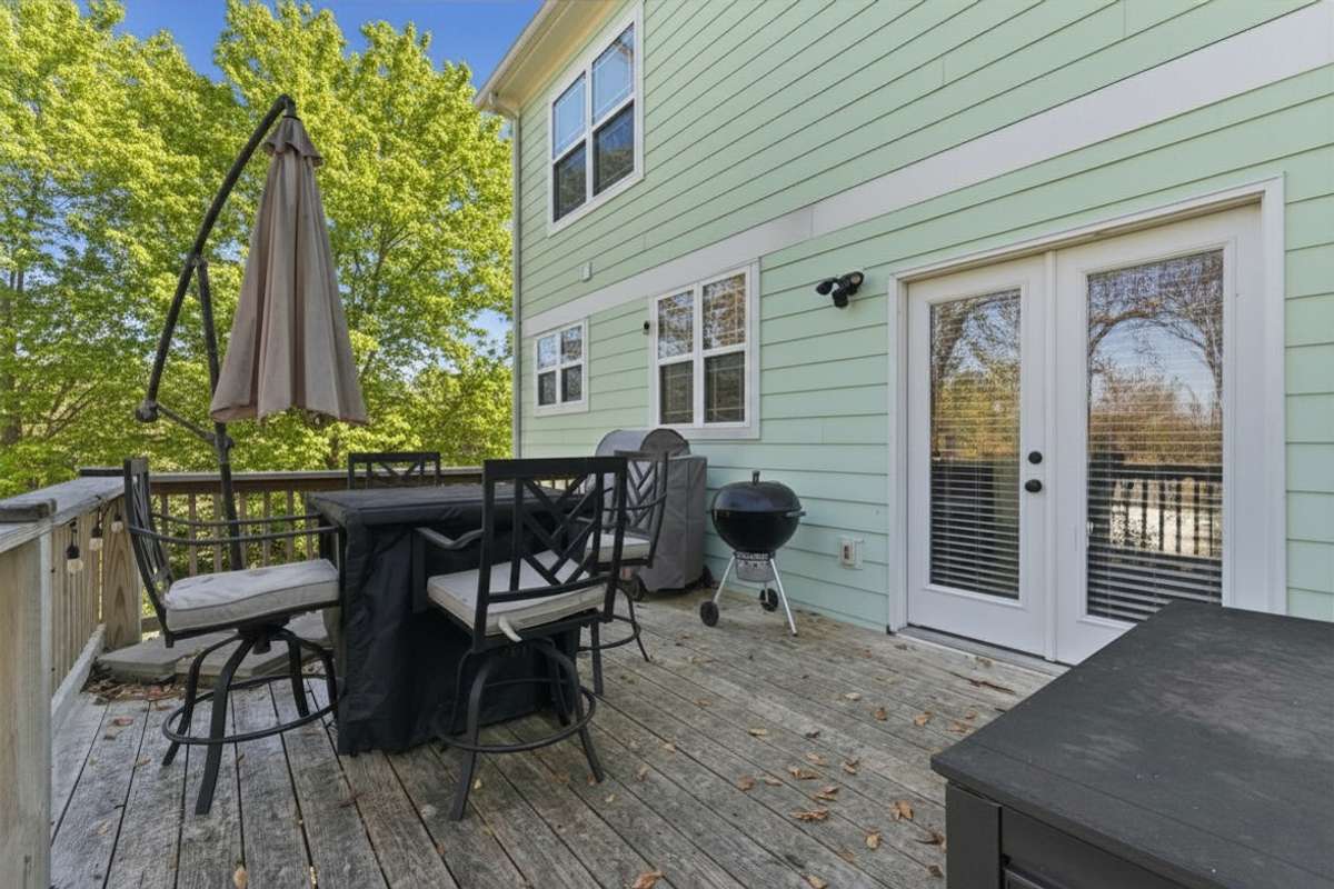 Photos have been virtually enhanced to reflect spring foliage and seasonal landscaping.