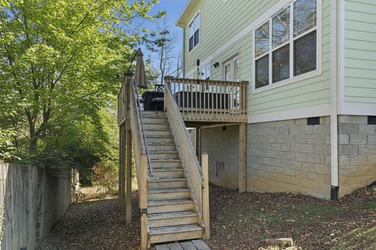 Photos have been virtually enhanced to reflect spring foliage and seasonal landscaping.