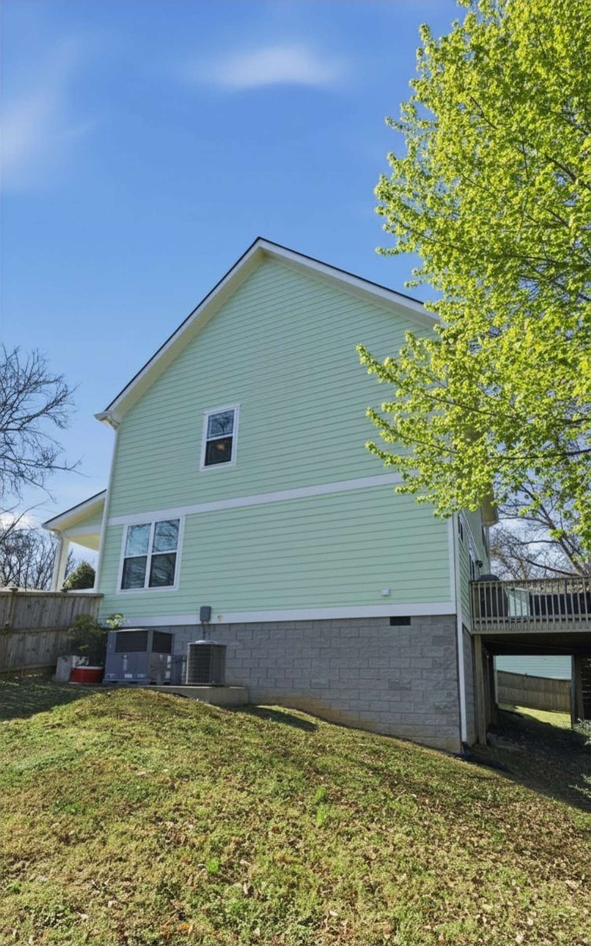 Photos have been virtually enhanced to reflect spring foliage and seasonal landscaping.