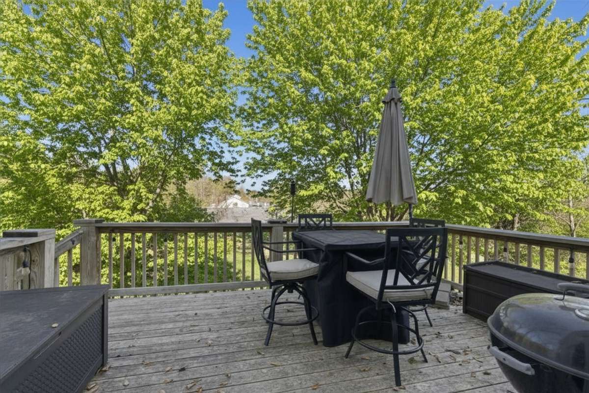 Photos have been virtually enhanced to reflect spring foliage and seasonal landscaping.
