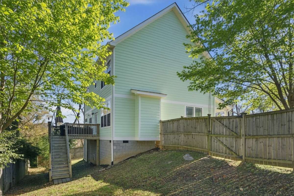Photos have been virtually enhanced to reflect spring foliage and seasonal landscaping.