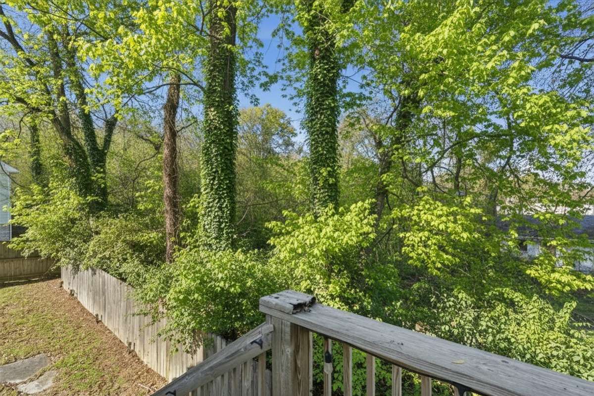 Photos have been virtually enhanced to reflect spring foliage and seasonal landscaping.