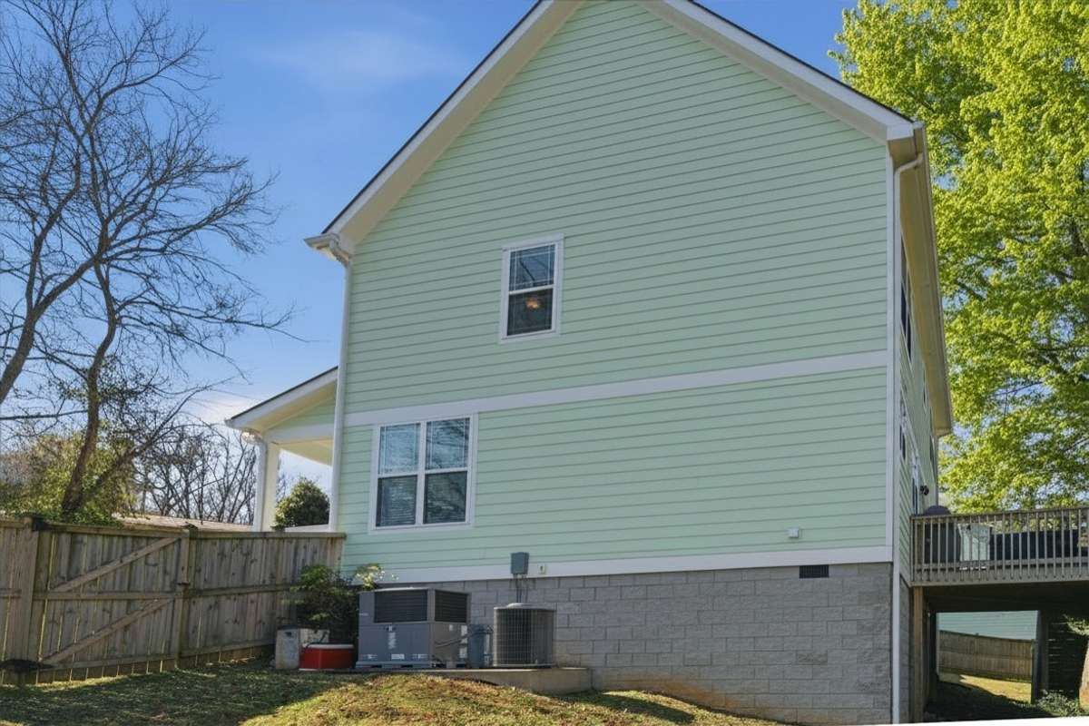 Photos have been virtually enhanced to reflect spring foliage and seasonal landscaping.