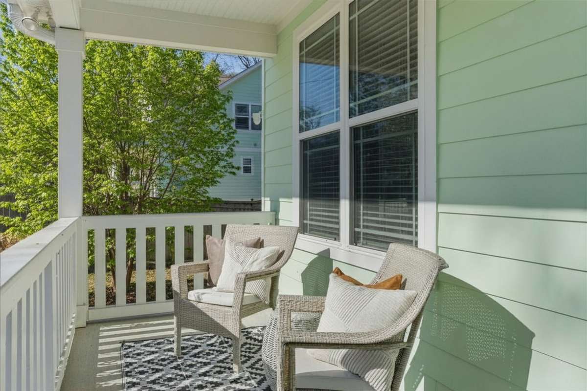 Photos have been virtually enhanced to reflect spring foliage and seasonal landscaping.