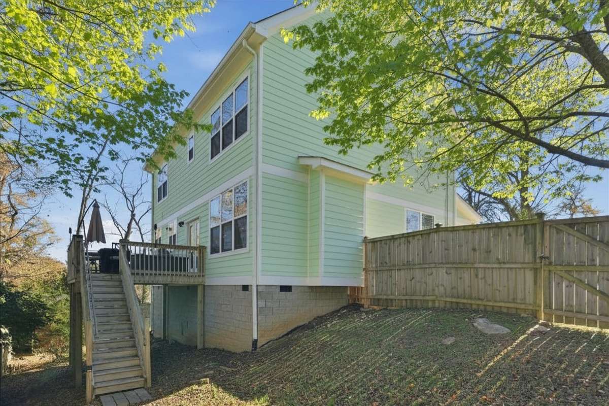 Photos have been virtually enhanced to reflect spring foliage and seasonal landscaping.