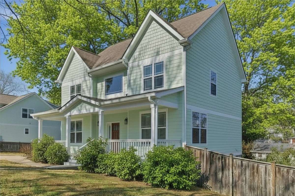 Photos have been virtually enhanced to reflect spring foliage and seasonal landscaping.