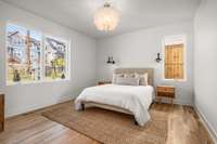 The primary suite sits on the main level