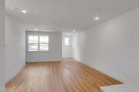 Here's another look at the open living area, showcasing its seamless flow and inviting atmosphere