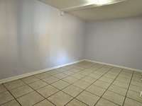 Massive bedroom for a condo of this size. Plenty of space for a king bed, furniture, and even a desk.