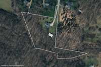 A creek runs along the back property line.