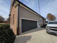 2 car garage on side of home