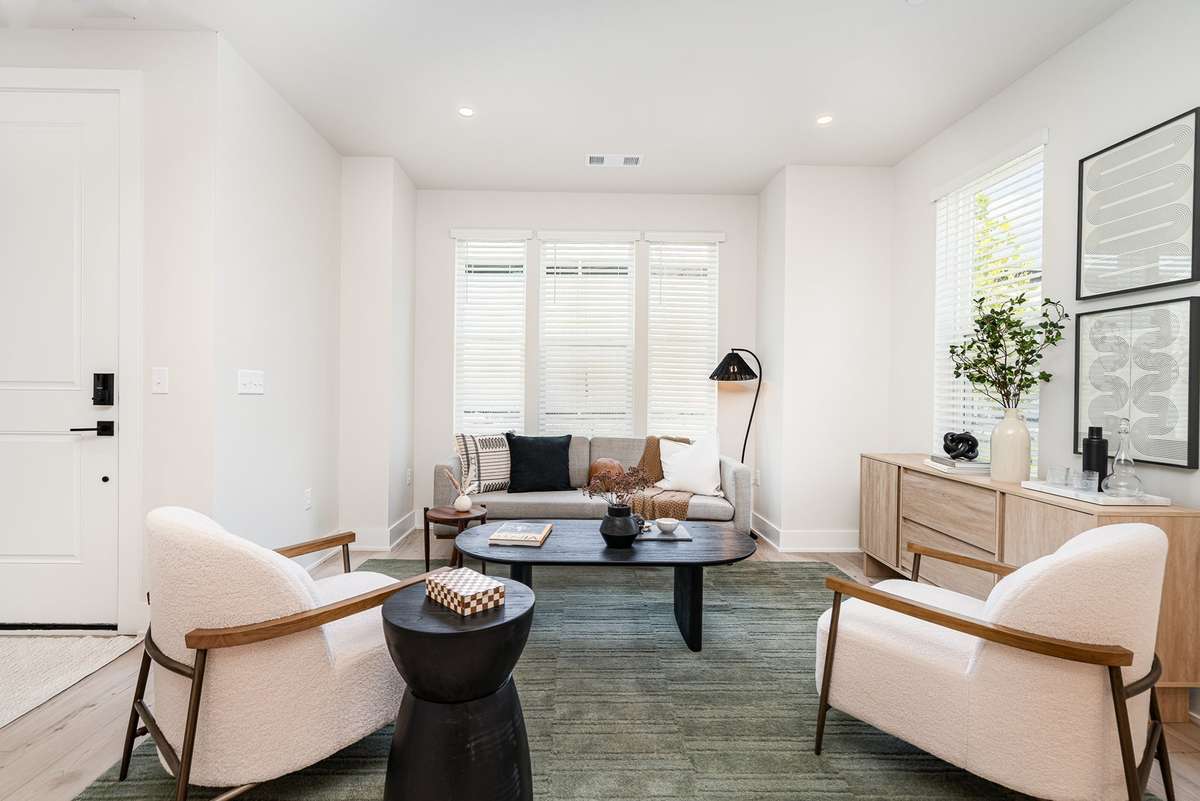 Living area *Photos and renderings are for representational purposes only are of a similar floor plan with differing finishes*