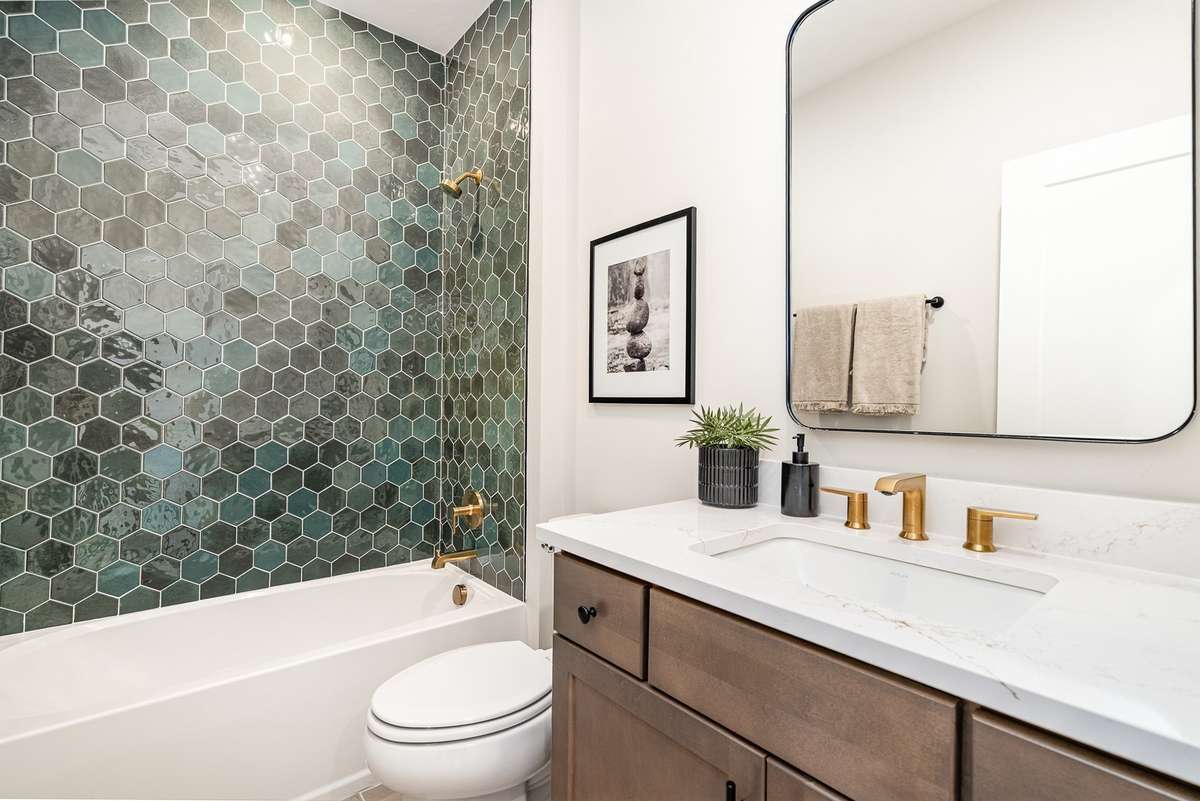 Hall bath *Photos and renderings are for representational purposes only are of a similar floor plan with differing finishes*