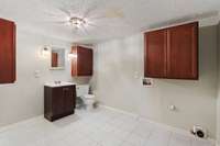 Half bath and laundry/could become full bath to 4th bedroom as primary bedroom