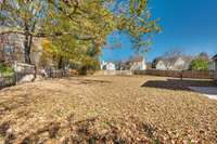 The photographer said this yard is so big you could keep a horse back here! You can't, but that was her first thought.