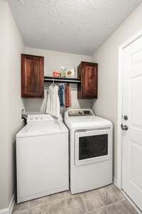 Laundry nook right off kitchen.