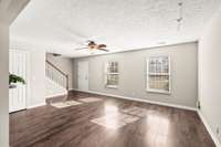 Living room is open to the kitchen and dining room.