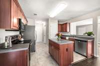 Stainless steel appliances remain. Ample cabinets. The microwave and dishwasher were recently purchased.