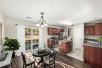 Virtually staged ~ dining area.