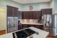 Another view of the kitchen where you can see the appliances up close. When you schedule your showing be sure to check out all the outlets in this kitchen.  You can never have too many!!!