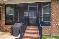 Screened in back porch accessible from living room and main bedroom. This would be a great place to have that first cup of coffee in the morning before your day begins or wind down at the end of the day.
