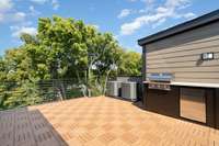 Built-in outdoor gas grill & beverage fridge, perfect for entertaining