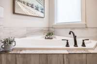 Imagine unwinding in this soaking tub.