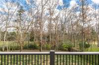 The back yard is fully fenced. You can see the bubbling brook from your yard!